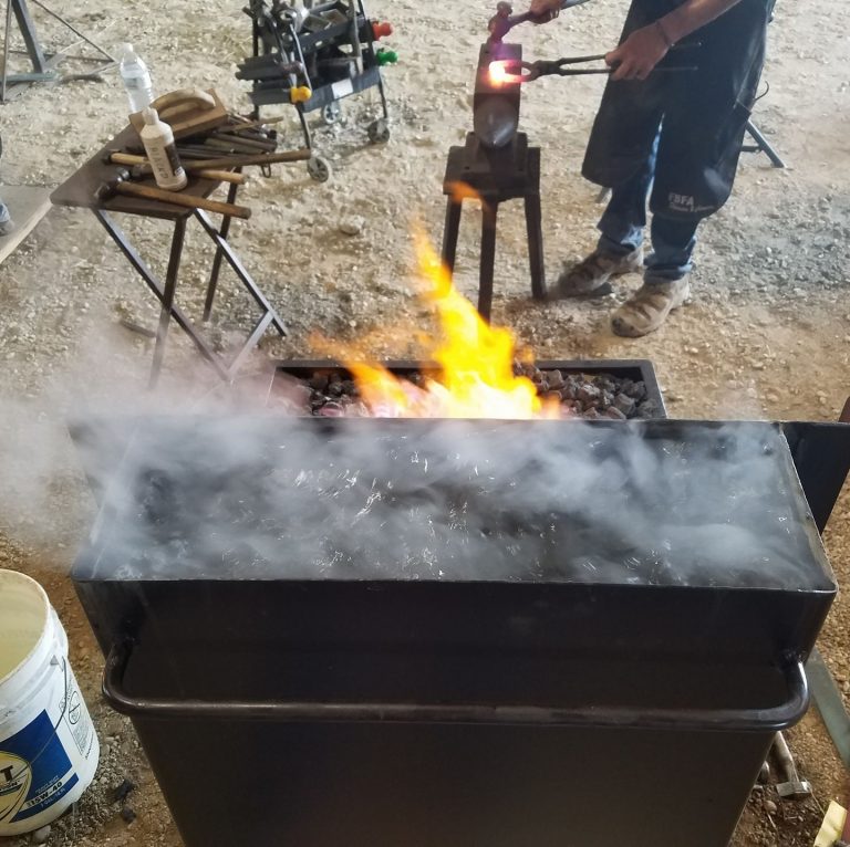 farrier working on horseshoe